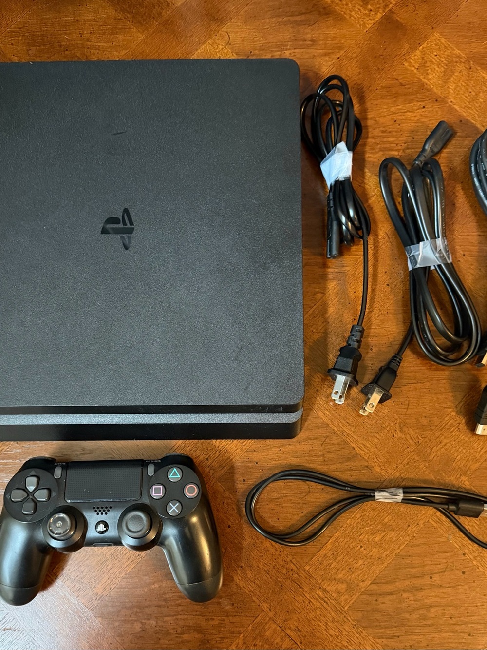 Sony PlayStation 4 (PS4) Slim Black Console Bundle with Controller and Cables